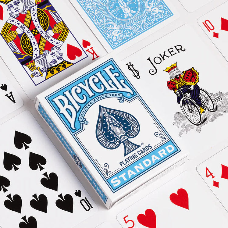 Bicycle playing cards with various cards displayed on a white background